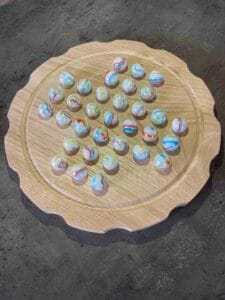 jeu du solitaire en châtaignier création Woody Woods Design entreprise individuelle française de création de jeux en bois (Gard) jeu en vente sur le site : www.woody-woods-design.fr